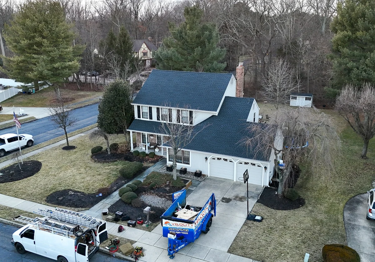 Completed Velocity Roofing roof replacement on a two-story home